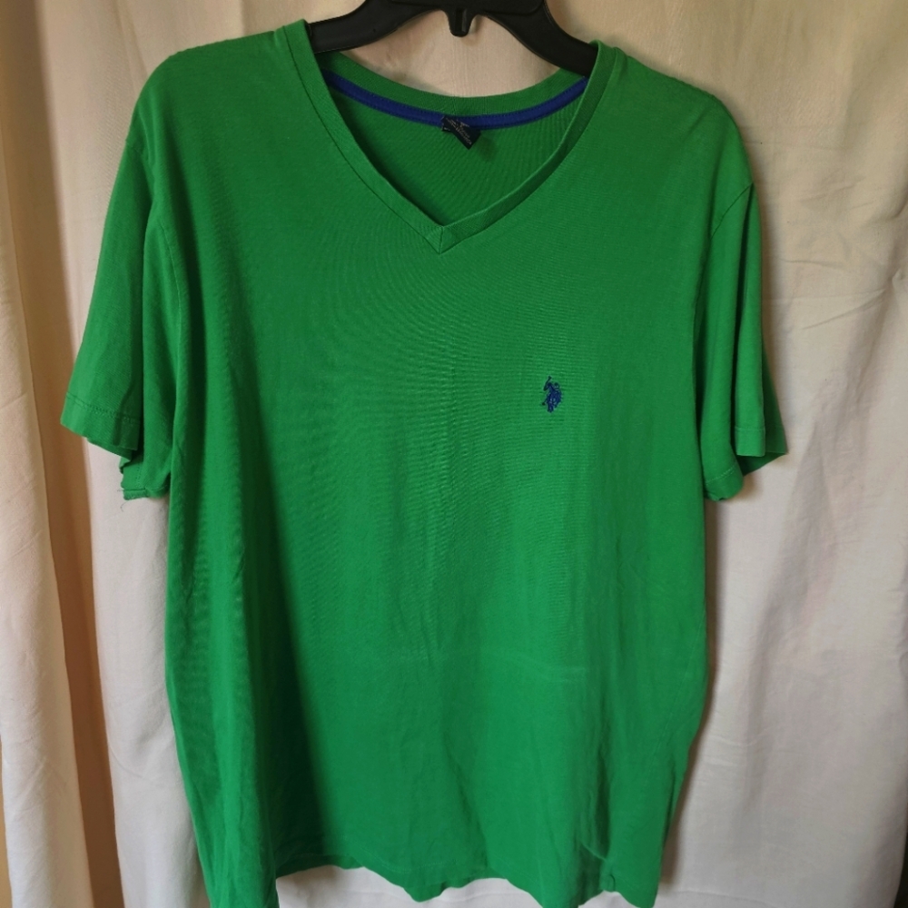 Bright green v-neck Pollo brand shirt perfect for vacations